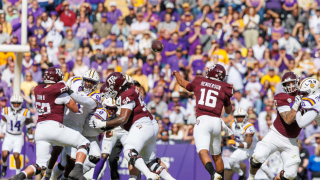 Texas A&M Aggies quarterback Jaylen Henderson (16) passes the ball against the LSU Tigers during the first half at Tiger Stadium.